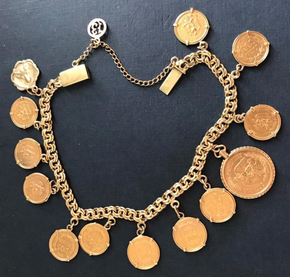 14 Karat Gold chain & 22 Karat  Mexican Gold Charm Bracelet